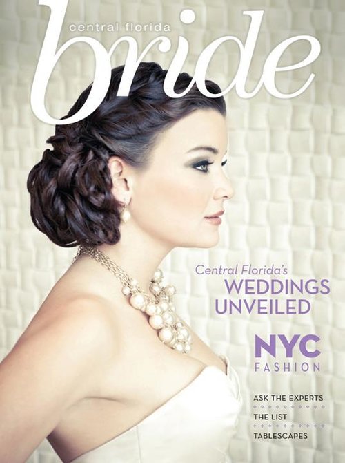 Bridal magazine cover featuring a woman with an elegant updo and necklace, highlighting wedding themes and NYC fashion. Relevant for bridal inspiration.